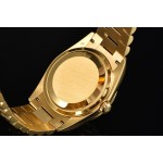 Sunday calendar series women's watch with diamond-set dial, gold bezel, 36mm case, and gold President-style bracelet.