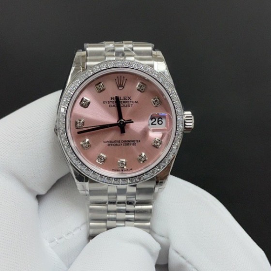 Datejust series, pink dial with diamonds, 31mm, two-tone gold and silver strap.