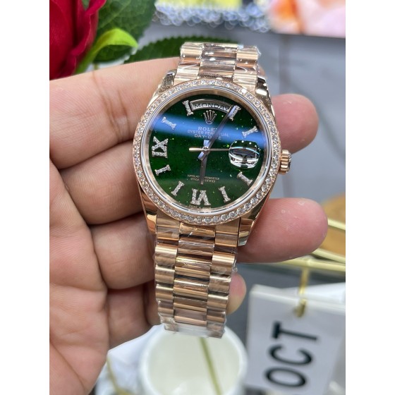 Sunday calendar series women's watch with diamonds, green dial, diamond-set bezel, 36mm, rose gold President-style bracelet.
