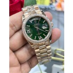 Sunday calendar series women's watch with diamonds, green dial, diamond-set bezel, 36mm, rose gold President-style bracelet.
