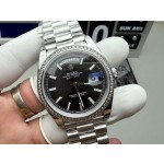 Sunday calendar series men's watch, black dial, diamond-set bezel, 40mm, silver President-style bracelet.