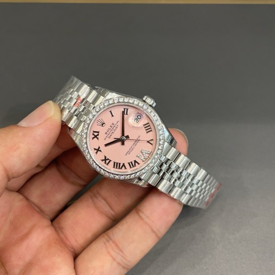 Datejust series, pink dial with diamonds, 31mm. Silver strap.