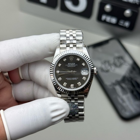 Datejust series, 31mm grey dial, silver strap.