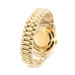 Sunday date display series men's watch, green dial, gold bezel, 40mm, gold President-style bracelet.