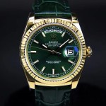 Sunday calendar series women's watch, green dial, gold bezel, 36mm, green leather strap.