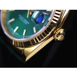 Sunday calendar series women's watch, green dial, gold bezel, 36mm, green leather strap.