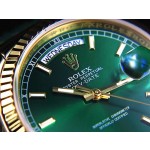 Sunday calendar series women's watch, green dial, gold bezel, 36mm, green leather strap.