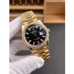 Sunday calendar series women's watch, black dial, diamond-set bezel, 36mm, gold President-style bracelet.