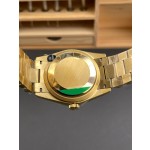 Sunday calendar series women's watch, black dial, diamond-set bezel, 36mm, gold President-style bracelet.