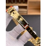 Sunday calendar series women's watch, black dial, diamond-set bezel, 36mm, gold President-style bracelet.