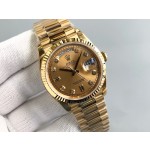 Sunday date display series women's watch with diamonds, gold dial, gold bezel, 36mm, gold President-style bracelet.