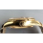 Sunday date display series women's watch with diamonds, gold dial, gold bezel, 36mm, gold President-style bracelet.