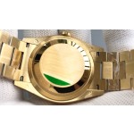 Sunday date display series women's watch with diamonds, gold dial, gold bezel, 36mm, gold President-style bracelet.