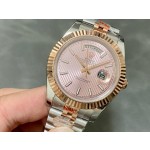 Sunday calendar series men's watch with pink dial, rose gold bezel, and 40mm two-tone five-link bracelet.