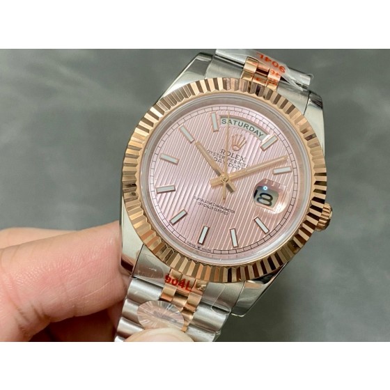 Sunday calendar series men's watch with pink dial, rose gold bezel, and 40mm two-tone five-link bracelet.