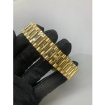 Sunday Calendar series men's and women's watches, gold dial, diamond-set bezel, 36mm and 40mm sizes, gold President-style bracelet.