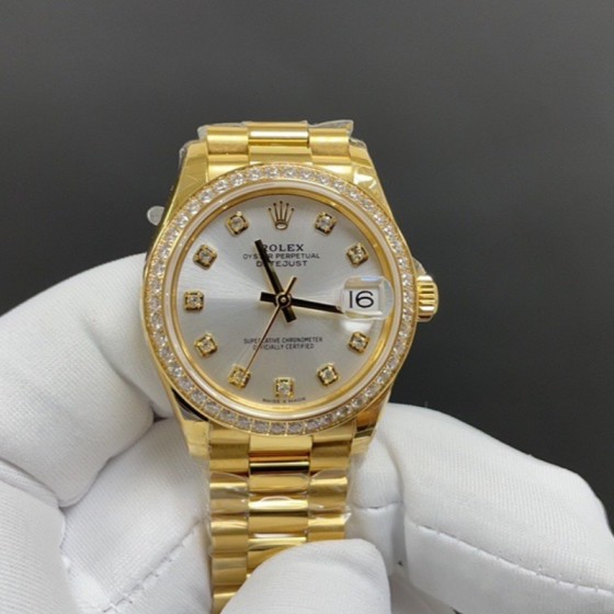 Datejust series, 31mm silver dial with diamonds, gold strap