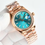 Sunday date display series women's watch, blue-green dial, rose gold bezel, 36mm, rose gold President-style bracelet.