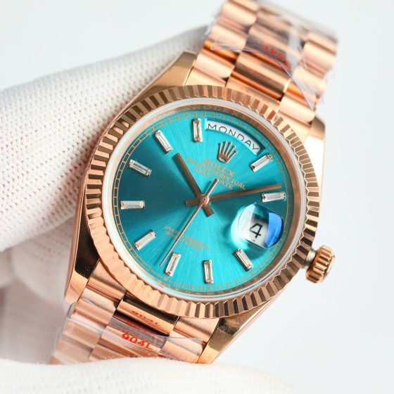 Sunday date display series women's watch, blue-green dial, rose gold bezel, 36mm, rose gold President-style bracelet.