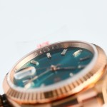 Sunday date display series women's watch, blue-green dial, rose gold bezel, 36mm, rose gold President-style bracelet.