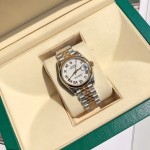 Datejust series women's watch, white dial, gold bezel, 31mm, two-tone five-link bracelet.