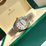 Datejust series women's watch, white dial, gold bezel, 31mm, two-tone five-link bracelet.