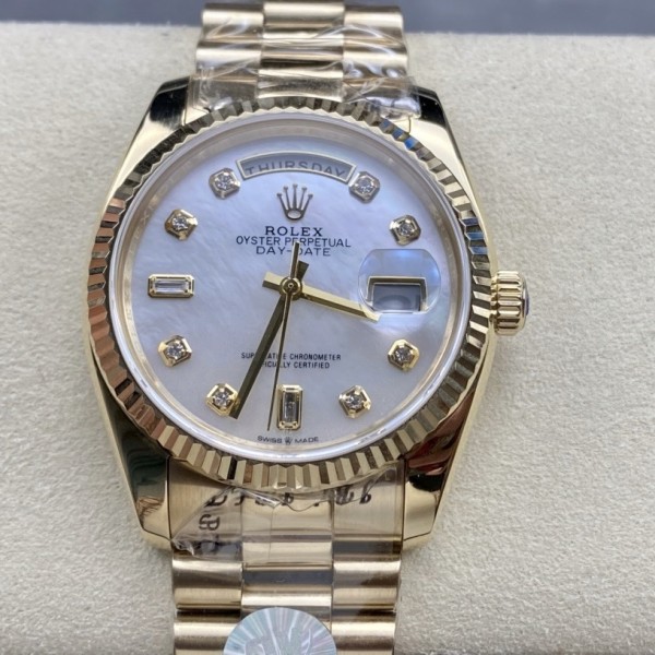 Sunday calendar series women's watch with diamond and mother-of-pearl dial, gold bezel, 36mm, gold President-style bracelet.