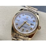 Sunday calendar series women's watch with diamond and mother-of-pearl dial, gold bezel, 36mm, gold President-style bracelet.