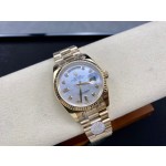 Sunday calendar series women's watch with diamond and mother-of-pearl dial, gold bezel, 36mm, gold President-style bracelet.