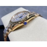 Sunday calendar series women's watch with diamond and mother-of-pearl dial, gold bezel, 36mm, gold President-style bracelet.