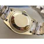 Sunday calendar series women's watch with diamond and mother-of-pearl dial, gold bezel, 36mm, gold President-style bracelet.