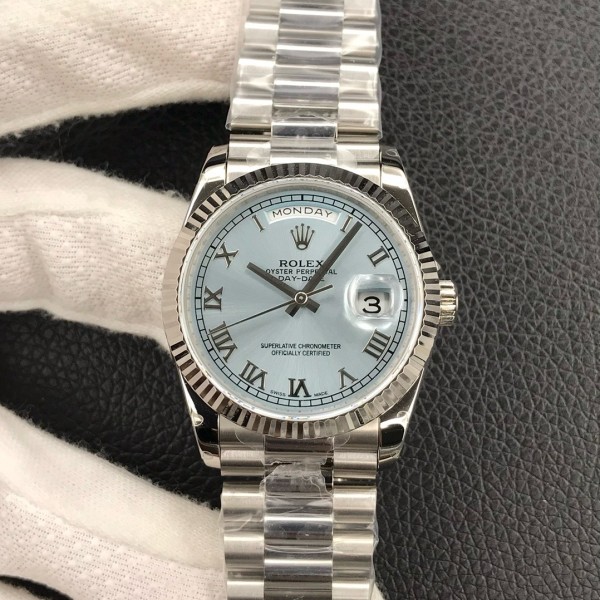 Sunday date display series women's watch, ice blue dial, silver bezel, 36mm, silver President-style bracelet.