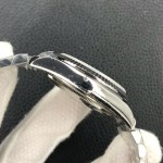 Sunday date display series women's watch, ice blue dial, silver bezel, 36mm, silver President-style bracelet.