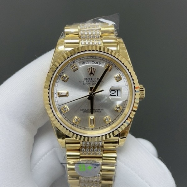 Sunday Calendar series women's watch, silver-gray dial, gold bezel, 36mm, with diamond-set gold President-style bracelet.