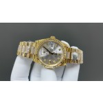 Sunday Calendar series women's watch, silver-gray dial, gold bezel, 36mm, with diamond-set gold President-style bracelet.