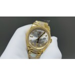 Sunday Calendar series women's watch, silver-gray dial, gold bezel, 36mm, with diamond-set gold President-style bracelet.