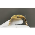 Sunday Calendar series women's watch, silver-gray dial, gold bezel, 36mm, with diamond-set gold President-style bracelet.