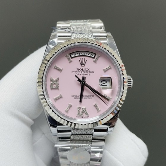 Sunday Calendar series women's watch, pink dial, silver bezel, 36mm, with diamond-set silver President-style bracelet.