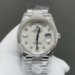 Sunday date display series women's watch, white dial, silver bezel, 36mm, with diamond-set silver President-style bracelet.