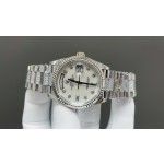 Sunday date display series women's watch, white dial, silver bezel, 36mm, with diamond-set silver President-style bracelet.