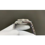 Sunday date display series women's watch, white dial, silver bezel, 36mm, with diamond-set silver President-style bracelet.