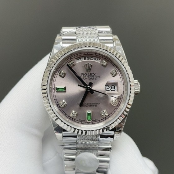 Sunday Calendar series women's watch, pink dial, silver bezel, 36mm, with diamond-set silver President-style bracelet.