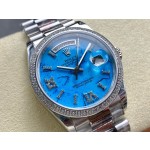 Sunday Calendar series women's watch, turquoise dial, diamond-set bezel, 36mm, silver President-style bracelet.