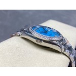 Sunday Calendar series women's watch, turquoise dial, diamond-set bezel, 36mm, silver President-style bracelet.