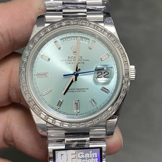 Sunday date display series women's watch, ice blue dial, diamond-set bezel, 36mm, silver President-style bracelet.