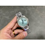Sunday date display series women's watch, ice blue dial, diamond-set bezel, 36mm, silver President-style bracelet.
