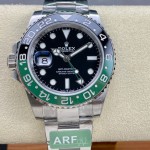 Rolex GMT-Master series, black dial, black and green bezel, 40mm, silver Oyster bracelet.