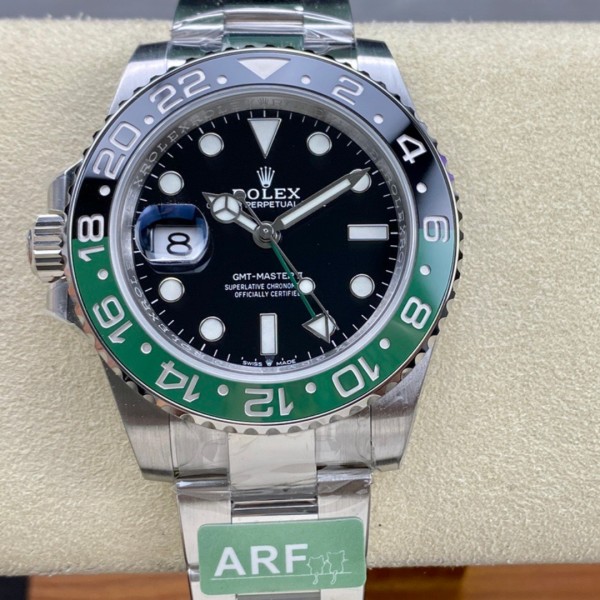 Rolex GMT-Master series, black dial, black and green bezel, 40mm, silver Oyster bracelet.