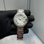 Cartier Ballon Bleu series, silver dial with diamond-set bezel, 42mm men's watch, silver strap, mechanical movement.