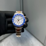 Yacht-Master series watch, white dial, blue bezel, 44mm, gold and silver Oyster bracelet.